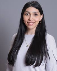 Roxana Flores, Program Assistant for Reception and Communications ...
