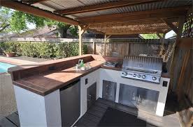 Awesome Covered Summer Kitchen With Stainless Steal Grill Burners Sink And Storage Cabinets In 2020 Summer Kitchen Outdoor Kitchen Kitchen