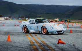 Dave Tabor and Greg Guio drove their Factory Five Type 65 Coupes at a 'test  and tune' event at Salinas Municipal Airport in CA. Although the runs  weren't formal times, they got