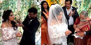 The couple had a christain wedding and exchanged rings and vows to get married. Vanitha Vijayakumar And Peter Paul Marriage Photos Out Tamil News Indiaglitz Com