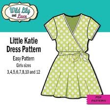 Great Basic Pattern For Kids Is A Delightful Comfort Dress With Mock Wrap Bodice And Simple A Line Ski Wrap Dress Pattern Simple Dress Pattern Mock Wrap Dress