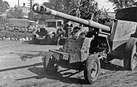 Two decades of anti-tank gun development - 3.7cm Pak 36 and 8.8cm Pak 43/41  under tow [785x500] : r/MilitaryPorn
