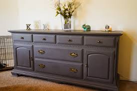 Yes, you can paint over stained wood without sanding, as paint can adhere to stain. How To Paint Your Dresser Without Sanding A Dash Of Kam