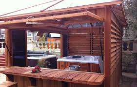 This airy enclosure provides both privacy and a degree of protection from the elements, and allows this hot tub easy accessibility all year round. Pool Spas Spa Enclosures And Gazebos