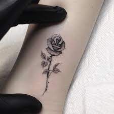 They're especially adored by women. 50 Tiny Rose Tattoos To Feed Your Beauty And The Beast Obsession Small Rose Tattoo Tiny Rose Tattoos Rose Tattoos On Wrist