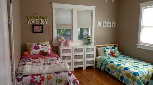 Here is a bedroom design with a more masculine vibe. Boy And Girl Room Bedroom Shared Girls Room Design With Pink Bed Regarding Kids Bedro Boy And Girl Shared Room Boy And Girl Shared Bedroom Shared Girls Bedroom