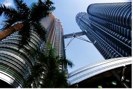 The petronas twin towers, standing at an altitude of 451.9 meters (1,483 ft), is the tallest building in southeast asia and in the world since its inauguration in 1998 to 2004. Petronas Towers Malaysia Heidelbergcement Group