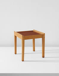 A shelf around the bottom of the table allows for further storage and a unique, minimalist silhouette. Jean Michel Frank Pagoda Side Table Circa 1930 Design Day Sale London Wednesday April 27 2016 Lot 122 Phillips