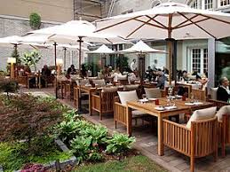 Editions Debeur Maison Boulud Un Restaurant Haut De Gamme A L Hotel Ritz Carlton Patio Outdoor Decor Patio Umbrella