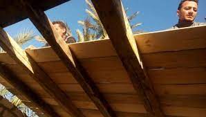 ألوان الوطن بالصور سقف خشب مبادرة شبابية لإعادة الدفء لمنازل فقراء الصعيد