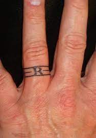 Ring Tattoo For Men Wedding Band Tattoo Ring Finger Tattoos Wedding Ring Finger Tattoos