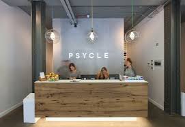 Psycle London A New Industrial Feel Gym In The Centre Of London Is The Place To Reception Desk Office Reception Desk Reception Desk Design