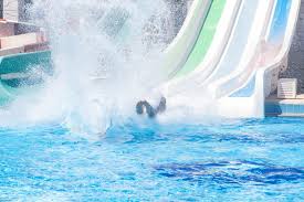 By the look of those black clouds, it's going to _____ down with rain any second. 5 Amazing Water Parks In Delhi To Refresh Yourself