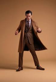 Whatever your gender, age, or style, it's the one coat that transcends all fashion boundaries. Camel Long Hair Overcoat