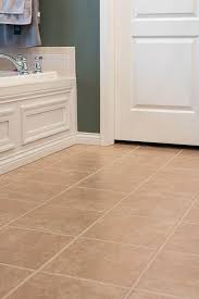 Then, go ahead and prime the rest of the floor tile with a small roller. Grout Paint Before And After Easy Tile Transformation The Lived In Look