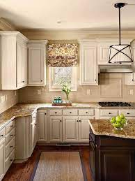 Reface the dark faded cabinets with brighter ones in champagne and light brown color that gives the whole kitchen a warm and charming tone. Kitchen Design Photos Hgtv Kitchen Cabinet Inspiration Kitchen Remodel Kitchen Redo