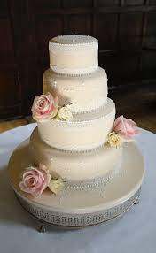 Four Tier Wedding Cake With Sugarveil Lace Piped Royal Icing Side Design Decorated With Fresh Pink Avalanche Roses Bolo De Casamento Bolo Casamento