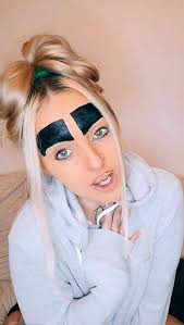 Mum with "Britain's biggest eyebrows" calls critics 'brainwashed'