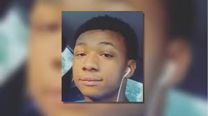 Former officer accused of killing 20-year-old during chase turns himself  into police