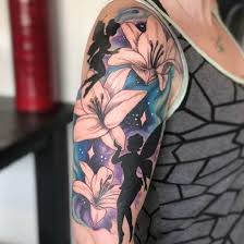 Awesome color lily tattoos design. Top 30 Lily Tattoos Beautiful Lily Tattoo Designs Ideas