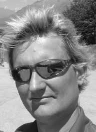 Flow Patterns and Transport in Rayleigh Surface Acoustic Wave Streaming:  Combined Finite Element Method and Raytracing Numerics