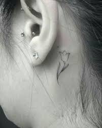 This Tiny Tulip Subtle Tattoos Tulip Tattoo Tattoos