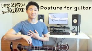 Do you have a video that talks about how to hold the guitar while standing? Guitar Posture Right Way To Hold The Guitar Pick