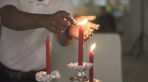 A man lighting up the candle from another candle. Closeup Hands Waiter Lighting Candles Elegant Restaurant Romantic Dinner Concept Video By C Nelka7812 Stock Footage 186613186
