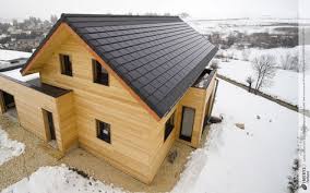 Des Tuiles Photovoltaiques Performantes Et Esthetiques Alpha Solaire D Imerys Toiture Pour Cette Maison A Ossature Avec Images Maison Ossature Bois Toiture Ossature Bois