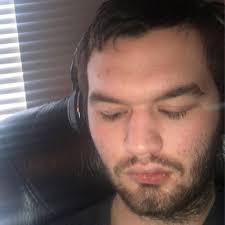 What book features a young hero with a zero score in a testing system that  determines one's potential?