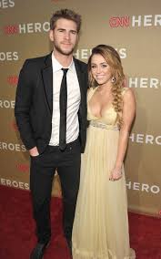 Even miley cyrus had a small struggle when she introduced liam hemsworth to her family and her brother trace tried to be tough on him, but it miley cyrus has never been known for her subtlety, so why should her valentine's day post for her hubby be any different? Photo Of Miley Cyrus And Liam Hemsworth On The Red Carpet At Cnn Hereos Tribute Musiqqueen Com