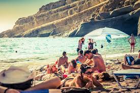 The beach of matala has been occupied since ancient times. Matala Beach First Found International Fame In The Late 1960s 70s When It Became A Destination For Young Travellers During Travel Places To Go Beach Festival