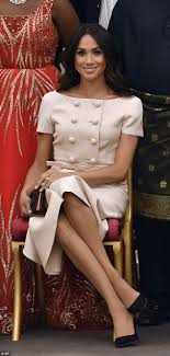 Because all we can see is an american tourist taking the same picture every other american tourist does. Why Meghan Markle Wears Pink As A Royal Express Digest