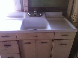 We have shipped quite a few sinks to hawaii and alaska. Vintage Crane Single Basin Double Drainboard Porcelain Over Cast Iron Sink And Vintage Bathroom Sink And Clawfoot Bathtub
