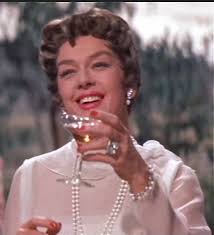 Auntie Mame. One of my very favorite movies. I read the book before I ever  saw the movie. I love Rosalind Russell.