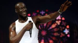 Dismissing plans for an event performance, big michael arrives to a burst of metal guitar shredding and declares his headline set a shoobz. Stormzy Scraps Asian Tour Over Coronavirus Bbc News