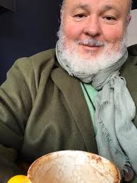 Relaxing with coffee in a laundromat