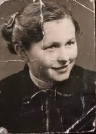 This is my mum, she is now 81 years old, her hair is the same colour as  mine, but she has brown eyes, she has ginger hair