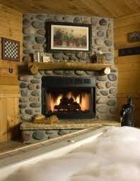 A river rock fireplace can be a beautiful and attractive addition to any home, particularly one with a rustic or country cottage décor. Log Home Design With Corner Fireplace Google Search River Rock Fireplaces Corner Fireplace Rock Fireplaces