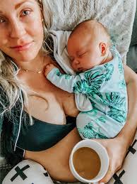 Boobs out, belly out, cold coffee in hand, still in my pajamas in the  middle of the afternoon, with a reallllly tired newborn