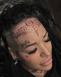 Image result for quirky pylon forehead tattoo