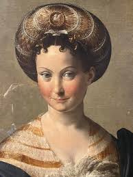 Portici del grano e uno dei gruppi scultorei più amato dai parmigiani che  affettuosamente li chiamano "i dù brasè", letteralmente ; i due abbracciati