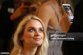 Debutante Millie Lockwood, from london, poses as she awaits the... News  Photo