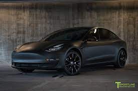 matte black tesla model 3 prototype style with 19 inch tst turbine wheels window tint and chrome delete matte black cars tesla model dream cars