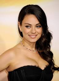 Mila Kunis ( in character ) Dr. Sharon Gil (