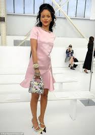 Covered Up For Once Racy Rihanna Donned Quite A Demure Pink Dress At The Dior Cruise Fashion Show In Brooklyn Wednesday Fashion Pink Dress Dresses