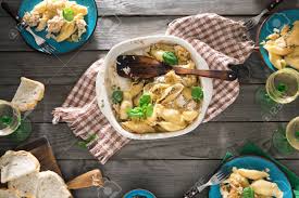 Best starter recipes for a dinner party; Dinner Party Food Dinner Table With Italian Pasta Salad And Wine Top View Rustic Style Stock Photo Picture And Royalty Free Image Image 76713553