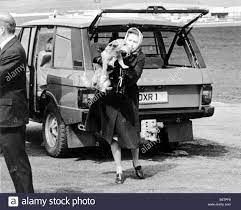 Download This Stock Image Queen Elizabeth 11 With Dog Corgi Range Rover B4tpf8 From Alamy S Library Of Millions Of Queen Elizabeth Queen Elizabeth Ii Queen