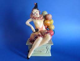A curious art deco figurine. Rare Wade Cellulose Art Deco Figure Carnival By Jessie Van Hallen C1930 Sold