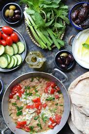 Foul Mudammas Egyptian Mashed Fava Beans With Olive Oil Lemon Juice And Garlic Recipe Egyptian Food Fava Beans Foul Recipe